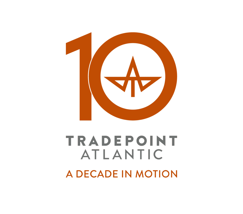 the logo for trade point atlantic, a decade in motion