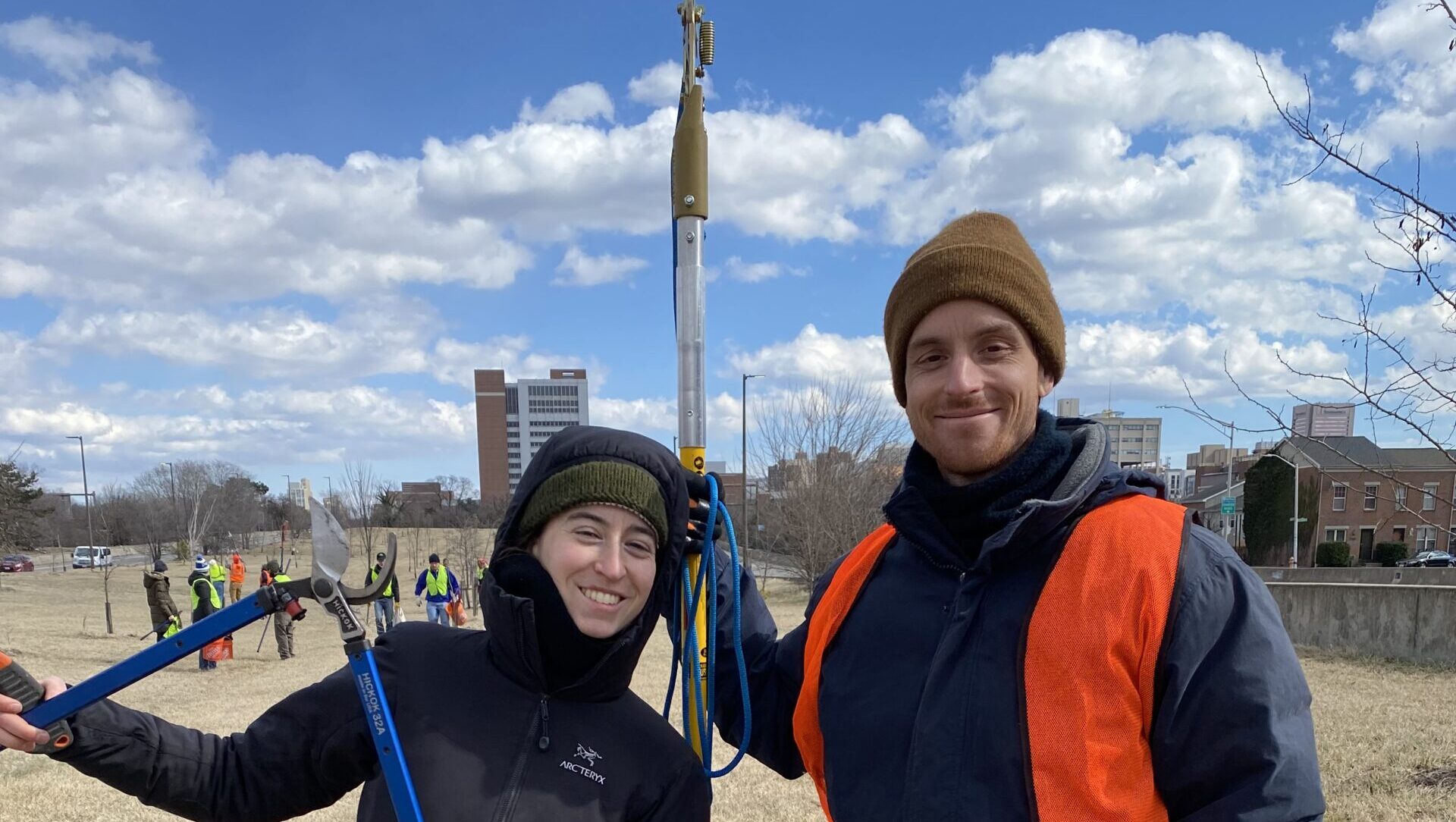 a couple of people standing next to each other