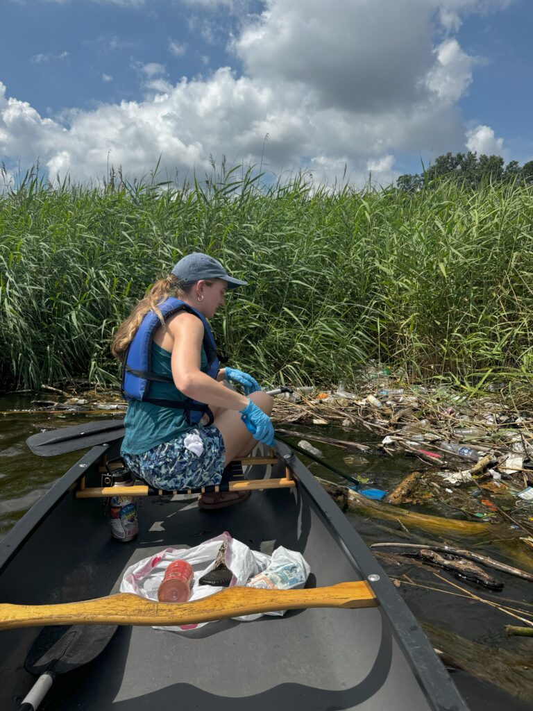a woman in a boat on a river