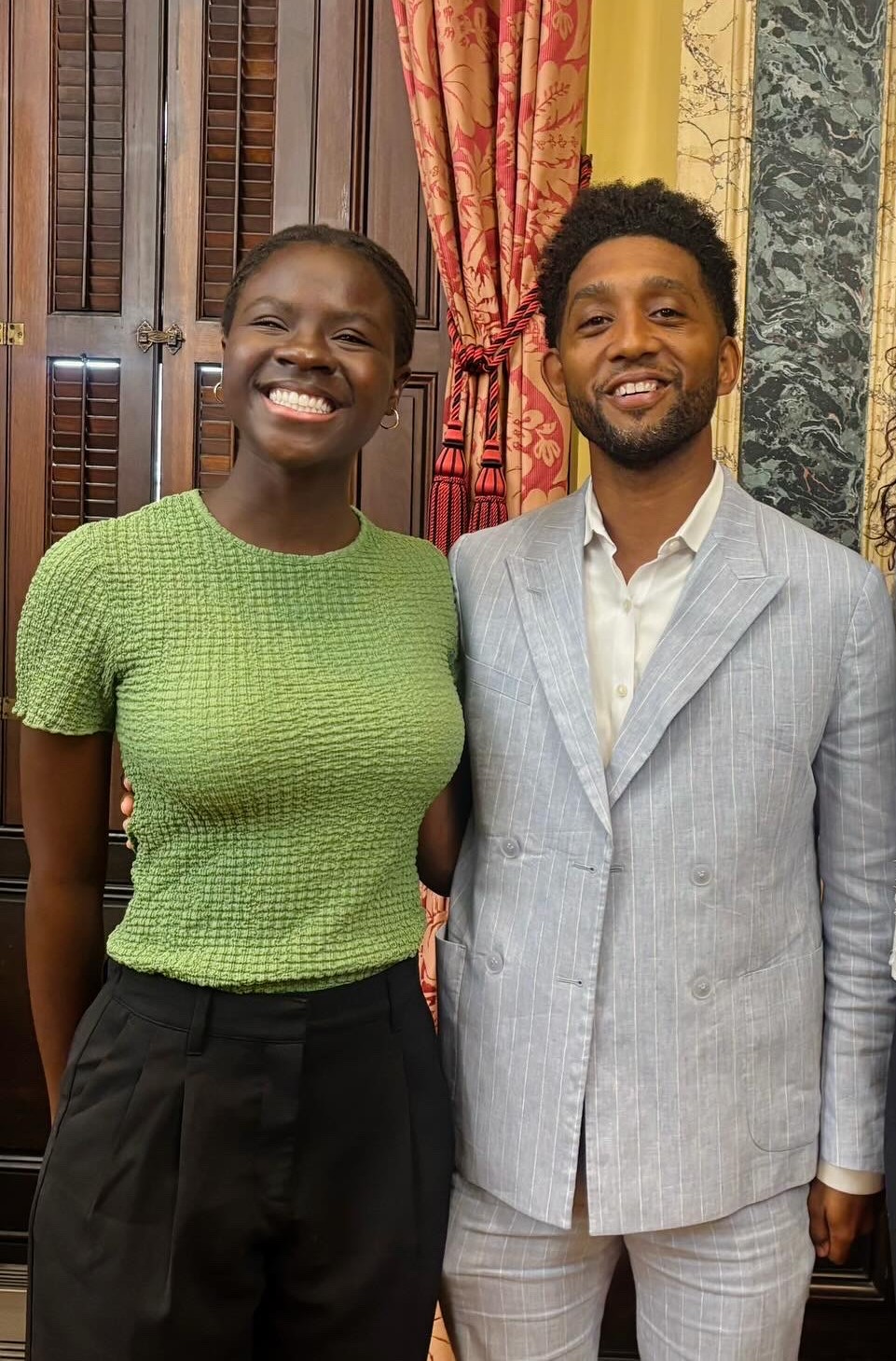 a group of people standing next to each other